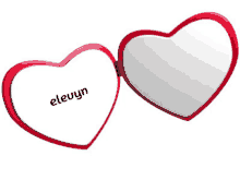 a pair of heart shaped mirrors with elevyn written on one of them