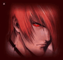 a man with red hair and red eyes is looking at the camera .