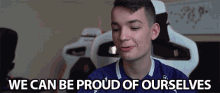 a young man sitting in a chair with the words " we can be proud of ourselves " written above him