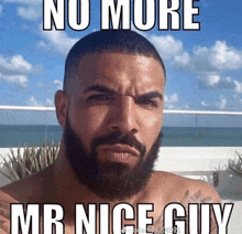 a man with a beard has a meme that says " no more mr nice guy "