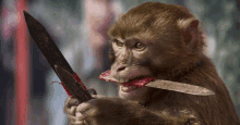 a monkey holding a knife in its mouth