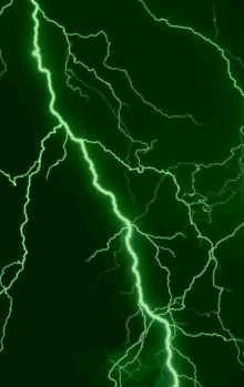 a close up of a green lightning bolt on a black background