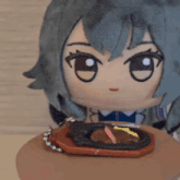 a stuffed doll is holding a steak on a plate