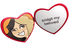 a heart shaped mirror that says bridget my beloved on it