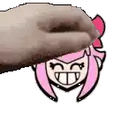 a hand is holding a cartoon girl 's head with a pink bow .
