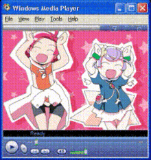 two girls are dancing in a windows media player app