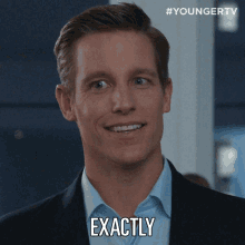 a man in a suit says exactly in front of a youngertv logo