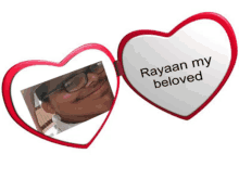 a heart shaped mirror with the words rayaan my beloved