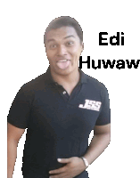 a man wearing a black shirt that says edi huwaw sticking out his tongue