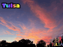 a picture of a sunset with the word tulsa on the top