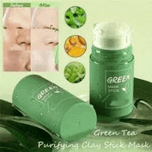 a bottle of green tea purifying clay stick mask is sitting on a table .