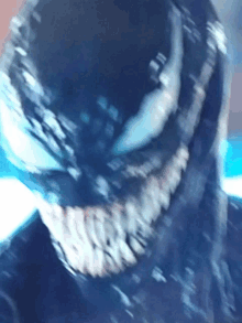 a close up of a person 's face with a mask on