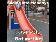 a child is sliding down a red slide at a playground with the caption sliding into mondays love you got me like .