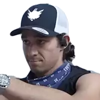a man wearing a bandana and a hat with a bird on it is looking at something