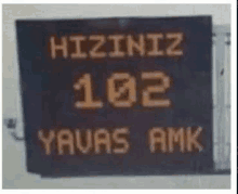 a sign that says hiziniz 102 yvas amk on it