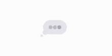 a white speech bubble with three dots on it on a white background .