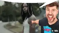 a man with a beard is pointing at a man with dreadlocks in a white tank top