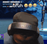 a man wearing headphones and a hat with the word bruh written on it