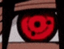 a close up of a red eye with a smiley face on it .