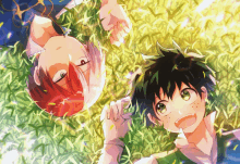 two anime characters laying in the grass looking up