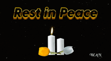 a rest in peace sign with two candles and a flower