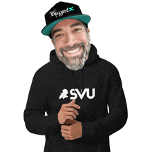 a man wearing a hoodie that says svu