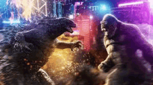 two monsters , godzilla and kong , are fighting each other in front of a city .