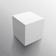 a white cube with a shadow on a white background