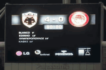 a scoreboard displays the score of a soccer game between blanco and edinho