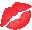 a close up of a broken red kiss on a white background