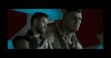 thor and hulk are standing next to each other in a movie scene