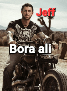 a man is riding a motorcycle with bora ali written on the front