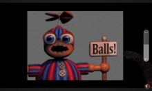 a cartoon character is holding a sign that says " balls "