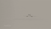 a computer generated image of an airplane on fire with the words ausdev in the lower right corner