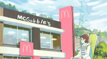 a girl riding a bike in front of a mcdonald 's restaurant