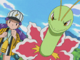a girl in a baseball cap is standing next to a green and pink pokemon
