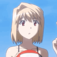 a girl with blonde hair and red eyes is wearing a bikini