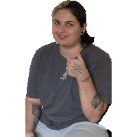 a woman giving a thumbs up with a tattoo on her hand