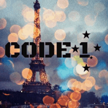 a picture of the eiffel tower at night with the words code 1