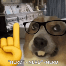 a dog wearing glasses is pointing at a yellow hand that says nerd