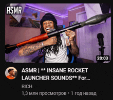 a man with dreadlocks is holding a rocket launcher