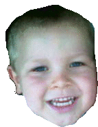 a close up of a child 's face with a smile on it