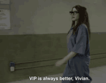 a woman wearing glasses and a gray shirt says vip is always better vivian