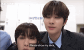 a man in a suit and tie is asking another man to show his neck