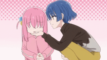 a girl with pink hair is being comforted by another girl with blue hair