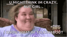 a woman is sitting in a chair with a caption that says u might think im crazy but girl