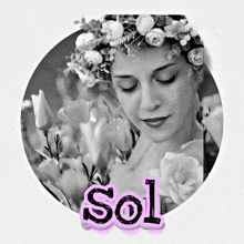 a black and white photo of a woman wearing a flower crown and the word sol written in pink