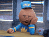 a cartoon character wearing a hat that says chief on it