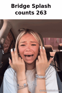 a girl crying in a car with the words bridge splash counts 263 above her