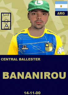 a man wearing a blue and yellow shirt and a green hat with the name bananairou on it